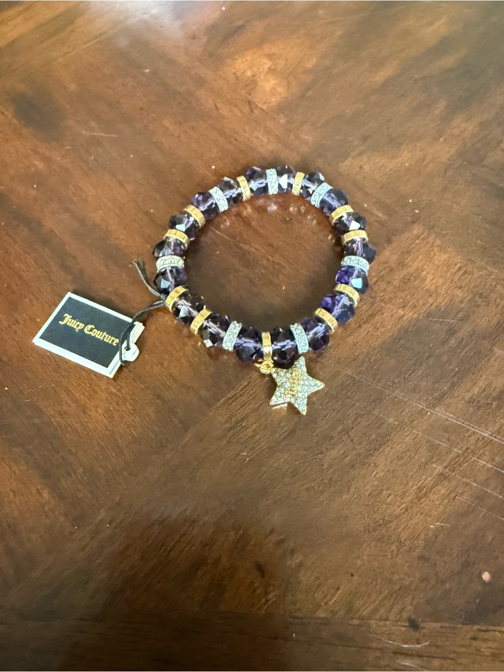 Juicy Couture Purple and Gold Crystal Stretch Bracelet with Star Charm